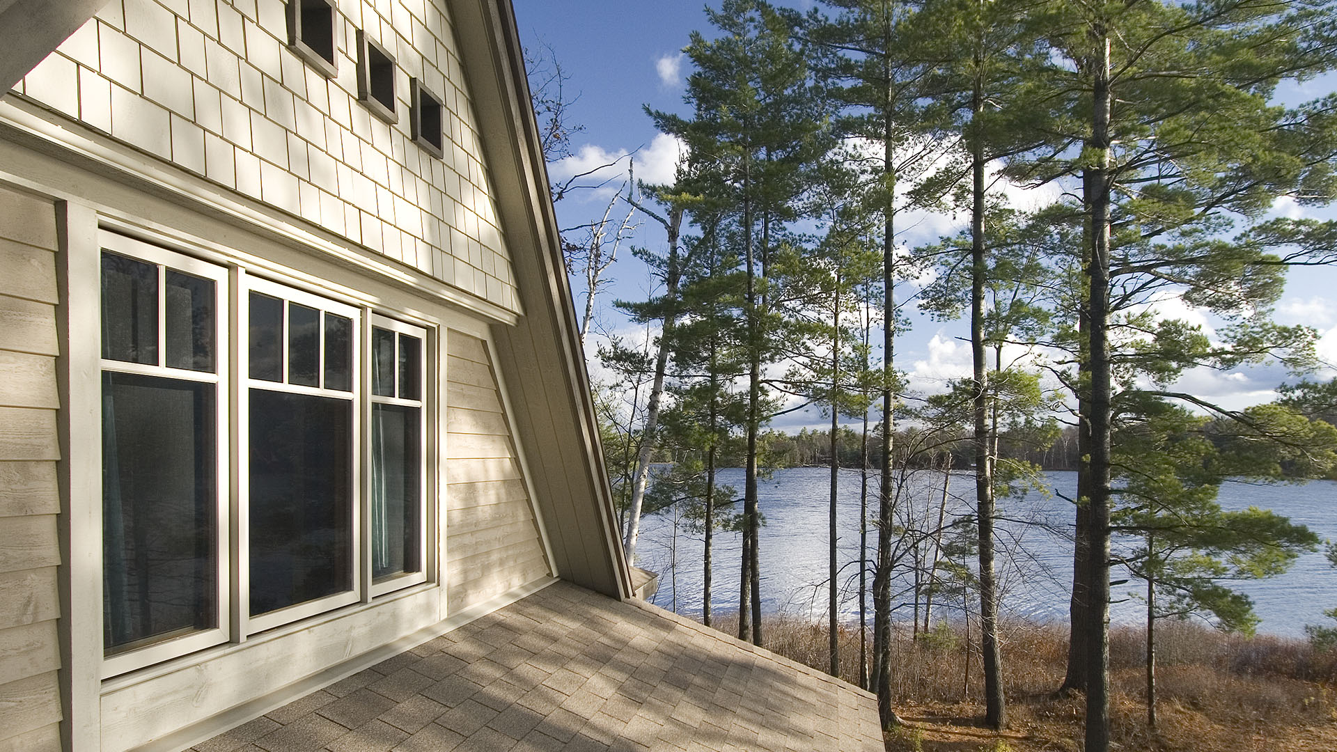 architect designed lakefront home - muskoka - bedroom overlooking lake